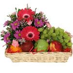 Send beauty and bounty with this lovely combination of fresh fruits and flowers....