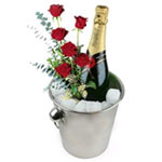This fine recipient includes a bottle of champagne and a 6 roses arrangement . P...
