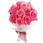 This twelve pink roses bouquet carries the message of happiness and joy, sweetne...