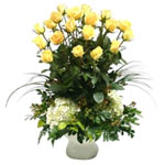 Eighteen deluxe yellow roses decorated with hortensias or and fine fillers...