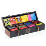 * Wood case with drawings containing 60 sachets Pa...