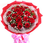This elegant bouquet is made of 12 red roses and greenery beautifully arranged i...