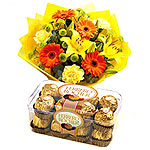 Celebrate the joy of live with a colorful bouquet and a delicious chocolate box....