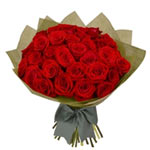 Stunning long stemmed roses presented in a delight...