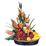 A delicious fruit and flower basket containing qua...