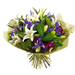 Create a little magic with this impressive bouquet of fresh seasonal flowers: or...