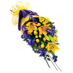 A gorgeous yellow and purple sheaf bouquet made up of classic lilies, spray rose...