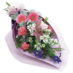 A wonderful pink white and purple sheaf bouquet consisting of elegant sims carna...