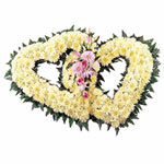 A fascinating double heart tribute in white containing pretty roses, chrysanthem...