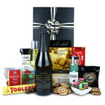 Gift includes: Sparkling Australian wine 750ml, Caf  Adore rich buttery shortbre...