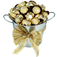 Gift someone close to your heart this Pretty Pot of Gold Assortments and appreci...