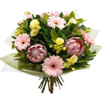 Cheer up a friend with this delightful flower bouq......  to South Australia