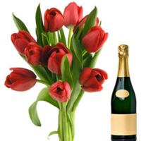 Traditional Festive Selection of Red Tulips with Bottle of Champagne