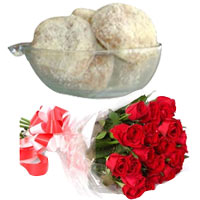 Scrumptious Bondia Laddu from Rosh Sweets N Mix Roses in a Bunch