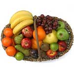 Hamper of fresh fruits. Contains:- 12 pieces Bananas, 2 kg Maltas, 1 kg red Appl...