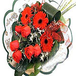  6 pcs red roses with gerbera in a nice bouquet. I...