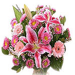 Lily with gerbera and greenery arrange in a bouque...