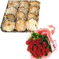 Pleasurable Banoful Special Katajam Sweets with Red Roses Bouquet