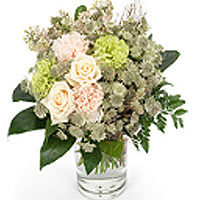 A sweet floral mix of cream and pastel colors! A soft bouquet perfect to congrat...