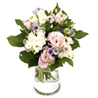 Arrangement of these season's trend in sweet pastels! Lovely scented freesia, be...