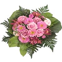 This charming arrangement of assorted  flowers in shades of Pink  is worth more ...