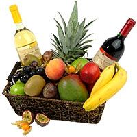 Fruit basket with white and red wine