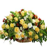 Nice beautiful and rich flower arrangement with fresh roses and chrisants in cre...