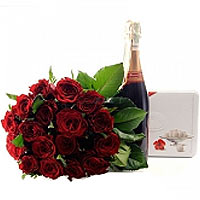 Luxury gift - a set of roses, champagne and chocolates