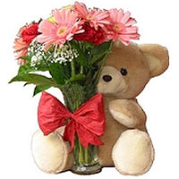 Send this flowers with a Bear....