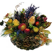 New Year basket of natural cones filled with artif...