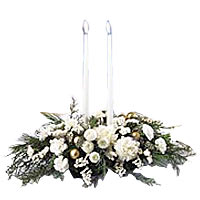 Set a gracious table with this elegant centerpiece of winter white garden blooms...