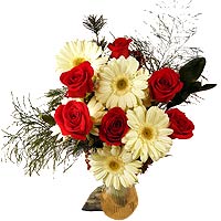 This beautiful New Year arrangement of exquisite r...