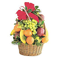 This lofty basket of fruit will make quite an impr......  to Saint-sauveur