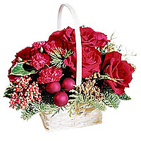 A handled basket carries red roses and red mini ca......  to Magog