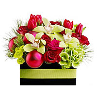 Heres a gift of New Year flowers thats both gorgeous and glamorous. A mix of e...