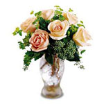 It's a poem of blooms in this glass vase arrangeme......  to Beloeil