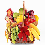 Wrapped up with your love, this Juicy Fruit Basket...