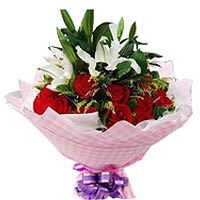 19 red roses, 3 white perfume lilies, with greens,...