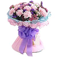 24 pink carnations, matched with greens, pink and blue wavy paper to wrap, round...