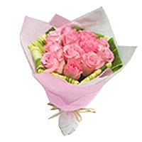 9 pink roses, matched with greens, pink round banquet, beautiful ribbon to tie. ...