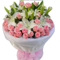 36 pink roses, 6 white lilies, white gauze,roung b...