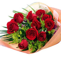 10 red roses, matched with greens, light orange pa...