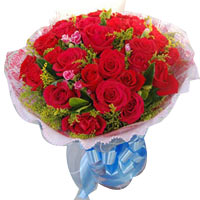 33 red roses with greens, pink round package, blue...