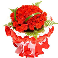 6 red roses, mach greenery, white paper wrap insid...