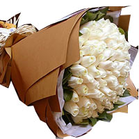 99 white roses, white tissue wrap inside, kraft pa...
