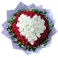 33 white roses in heart shape,33 red roses outside,with baby's breath and greens...