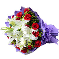 16 red roses and 3 whit lilies with greens, purple pacakge, hand banquet....