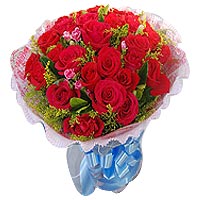 33 red roses with greens, pink round package, blue bownknot....