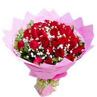48 red roses, with babybreath and greens, pink pacakge, hand banquet....