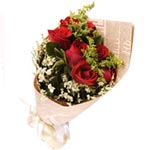 Beautiful Bouquet of 7 Red Roses with Greens